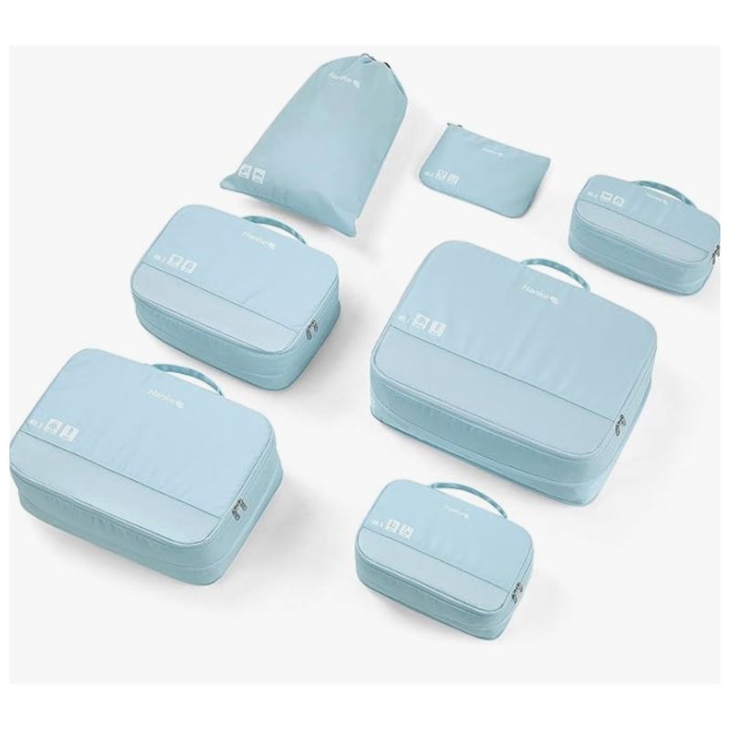 Hanke set of seven blue compression packing cubes for luggage